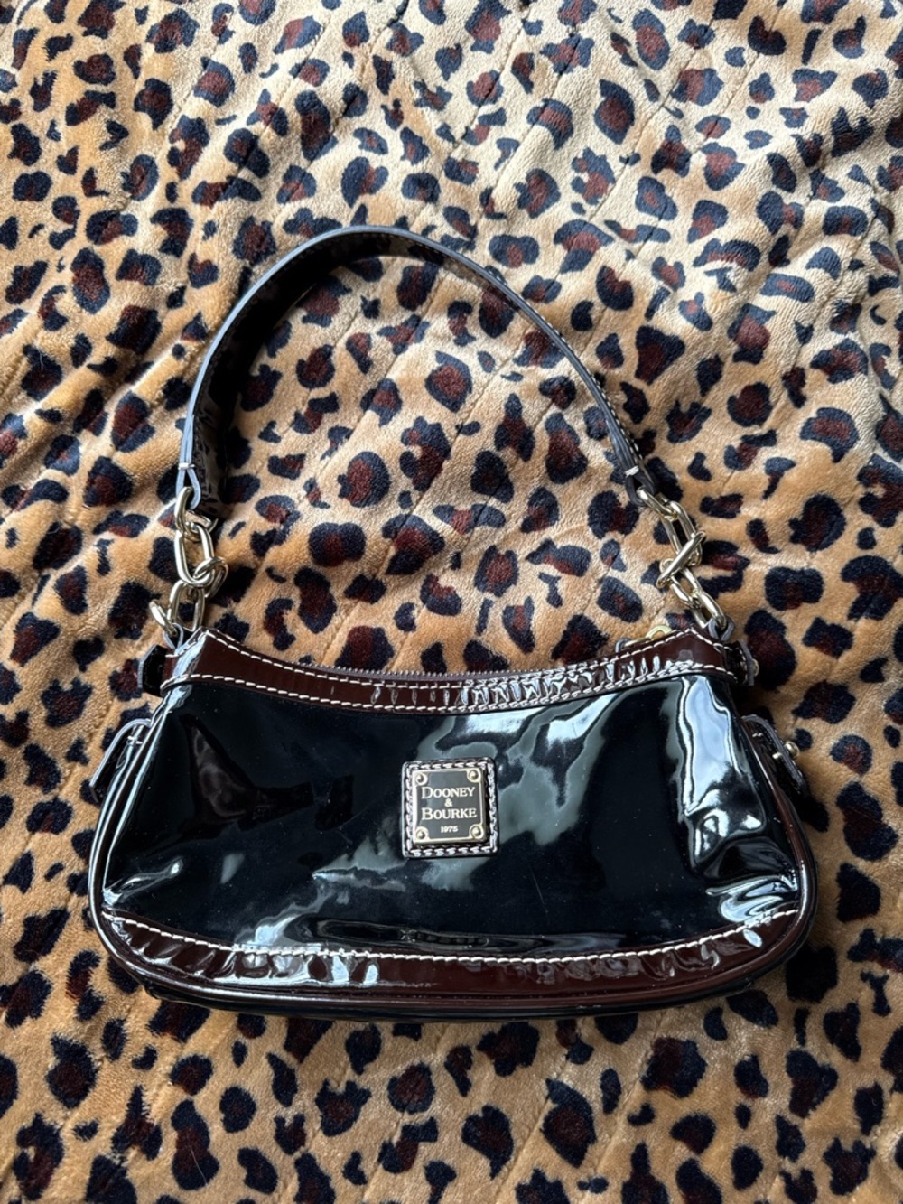 Dooney & Bourke Black Patent Leather Shoulder Bag with Brown Trim